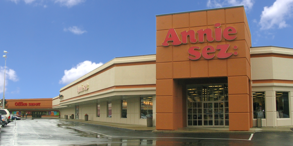 EIFS clad stores at shopping center on Roosevelt Boulevard, Philadelphia, Pennsylvania after repair and painting